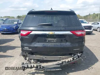 2020 Chevrolet Traverse Premier with VIN 1GNERKKW0LJ123828, listed as a IAAI auction lot 41947690 with 91,905 mi miles and . Bid and sale history available at DreamBid. Image 17.