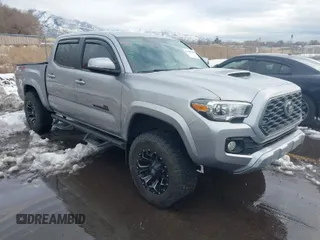 2021 Toyota Tacoma SR z VIN 3TMCZ5AN0MM386867, wystawiony jako IAAI lot #41580426 z przebiegiem 46 559 mil mil oraz . Historia ofert i sprzedaży dostępna na DreamBid. Obrazek 1.