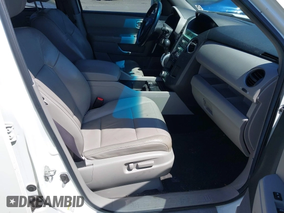 2011 Honda Pilot Touring with VIN 5FNYF4H98BB087713, listed as a IAAI auction lot 42132764 with 250,507 mi miles. Bid and sale history available at carsss.com. Image 5.
