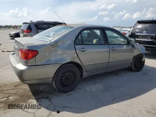 2004 Toyota Corolla CE with VIN 1NXBR32E74Z240293, listed as a Copart auction lot 52624445 with 299,999 mi miles and Salvage Title. Bid and sale history available at DreamBid. Image 3.