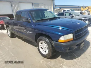2001 Dodge Dakota z VIN 1B7GL22X91S338711, wystawiony jako Copart lot #54914095 z przebiegiem 200 216 mil mil oraz Szkoda całkowita • Salvage title. Historia ofert i sprzedaży dostępna na DreamBid. Obrazek 4.