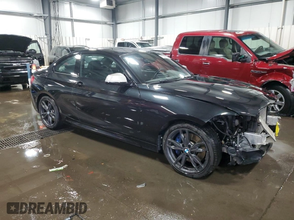 2016 BMW 2 Series M235i xDrive with VIN WBA1J9C5XGV695823, listed as a Copart auction lot 81548364 with 83,149 mi miles and Salvage Title. Bid and sale history available at carsss.com. Image 4.