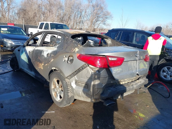 2015 Kia Optima LX with VIN KNAGM4A76F5555968, listed as a IAAI auction lot 41409612 with Not provided miles and . Bid and sale history available at DreamBid. Image 3.