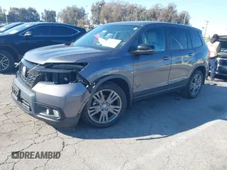 2019 Honda Passport EX-L with VIN 5FNYF7H58KB006501, listed as a IAAI auction lot 41752416 with 60,820 mi miles and . Bid and sale history available at carsss.com. Image 2.