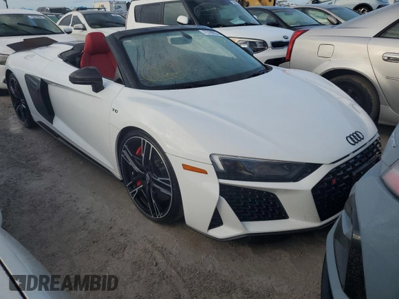 2020 Audi R8 Spyder performance z VIN WUA4BCFX3L7901606, wystawiony jako Copart lot #75199024 z przebiegiem Nie podano mil oraz Nie do naprawy. Historia ofert i sprzedaży dostępna na DreamBid. Obrazek 4.