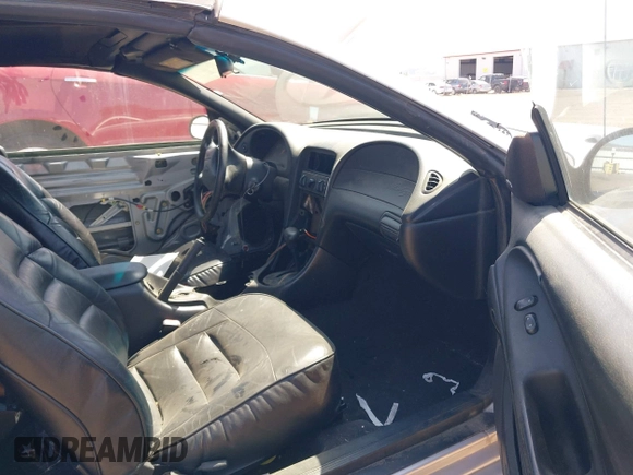 1998 Ford Mustang with VIN 1FAFP4444WF188494, listed as a IAAI auction lot 42158252 with 127,702 mi miles and . Bid and sale history available at DreamBid. Image 5.