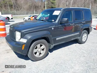 2011 Jeep Liberty Sport with VIN 1J4PN2GK6BW518711, listed as a IAAI auction lot 41858924 with 232,476 mi miles. Bid and sale history available at carsss.com. Image 2.