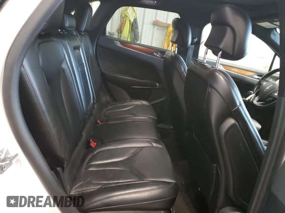 2019 Lincoln MKC Select with VIN 5LMCJ2D90KUL25654, listed as a Copart auction lot 56461185 with 56,296 mi miles and Salvage title. Bid and sale history available at DreamBid. Image 11.