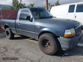 1998 Ford Ranger XL with VIN 1FTYR10C1WUB61936, listed as a IAAI auction lot 41514003 with 327,602 mi miles. Bid and sale history available at carsss.com. Image 1.