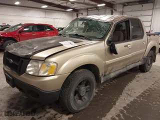 2003 Ford Explorer Sport Trac XLS with VIN 1FMZU77E63UB49429, listed as a IAAI auction lot 41396057 with 210,103 mi miles. Bid and sale history available at carsss.com. Image 2.