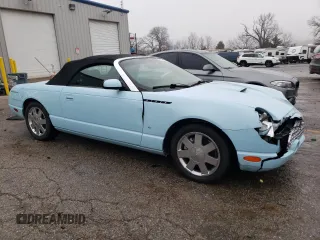 2003 Ford Thunderbird Deluxe with VIN 1FAHP60A03Y108186, listed as a Copart auction lot 86729574 with 79,624 mi miles and Salvage Title. Bid and sale history available at DreamBid. Image 4.