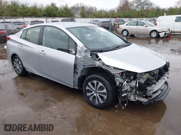 2021 Toyota Prius LE with VIN JTDKAMFP9M3170928, listed as a IAAI auction lot 42123934 with 58,293 mi miles and . Bid and sale history available at DreamBid. Image 1.