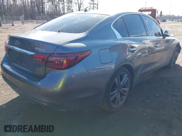2019 Infiniti Q50 Luxe z VIN JN1EV7AR2KM590794, wystawiony jako IAAI lot #40841640 z przebiegiem 68 720 mil mil oraz . Historia ofert i sprzedaży dostępna na DreamBid. Obrazek 4.