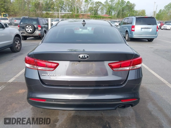 2016 Kia Optima LX with VIN KNAGT4L33G5107444, listed as a IAAI auction lot 41971006 with 174,997 mi miles. Bid and sale history available at carsss.com. Image 16.