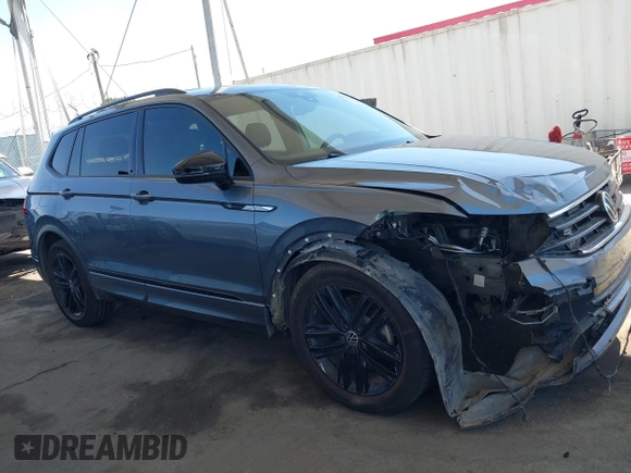 2022 Volkswagen Tiguan SE R-Line Black with VIN 3VVCB7AX8NM039730, listed as a IAAI auction lot 42313651 with 71,759 mi miles and . Bid and sale history available at DreamBid. Image 14.