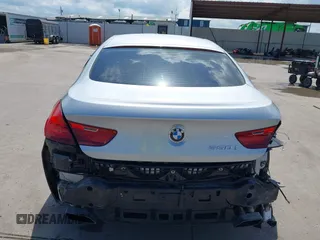 2015 BMW 6 Series 650i z VIN WBA6B2C55FGB99196, wystawiony jako IAAI lot #42107698 z przebiegiem 74 393 mil mil oraz . Historia ofert i sprzedaży dostępna na DreamBid. Obrazek 17.