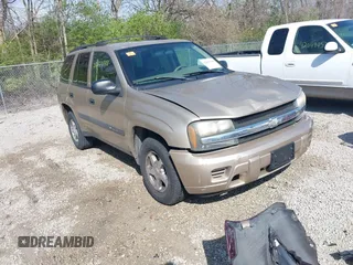 2004 Chevrolet TrailBlazer LT with VIN 1GNDS13S142422830, listed as a IAAI auction lot 42054144 with 218,042 mi miles and . Bid and sale history available at DreamBid. Image 1.