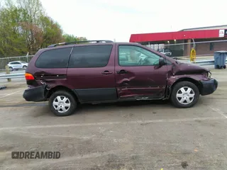 2000 Toyota Sienna LE with VIN 4T3ZF13C8YU209477, listed as a IAAI auction lot 41952970 with 293,084 mi miles. Bid and sale history available at carsss.com. Image 14.
