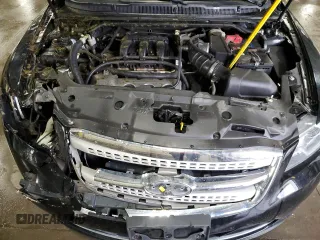 2012 Ford Taurus Limited с VIN 1FAHP2FW7CG100698, выставлен на аукционе Copart как лот 59015515 с пробегом 190 295 миль миль и Списание • Salvage title. История ставок и продаж доступна на DreamBid. Изображение 11.
