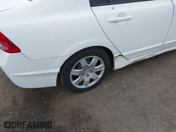 2006 Honda Civic LX with VIN 1HGFA16556L084177, listed as a IAAI auction lot 42053325 with 142,664 mi miles and . Bid and sale history available at DreamBid. Image 14.