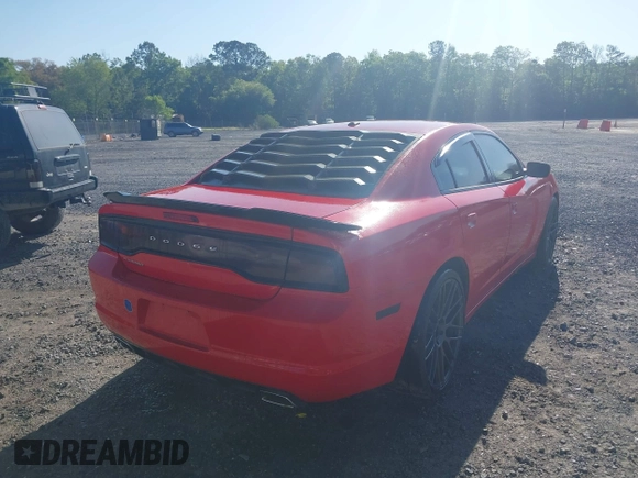 2013 Dodge Charger SXT with VIN 2C3CDXHGXDH742942, listed as a IAAI auction lot 42025564 with 292,681 mi miles. Bid and sale history available at carsss.com. Image 4.