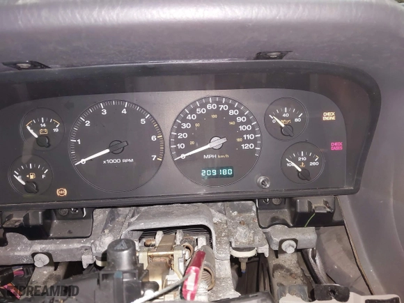 1999 Jeep Grand Cherokee Laredo with VIN 1J4GW58SXXC584734, listed as a IAAI auction lot 41902224 with 209,180 mi miles. Bid and sale history available at carsss.com. Image 7.