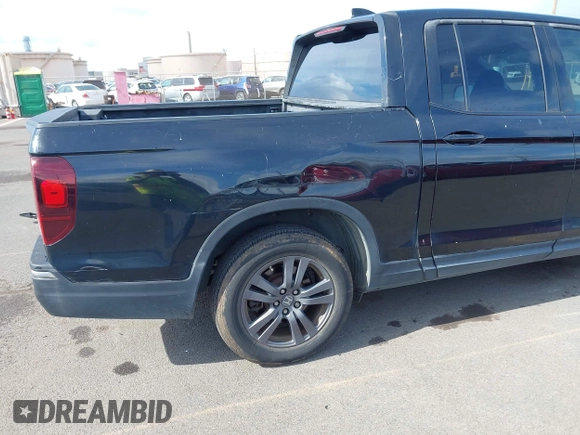2017 Honda Ridgeline Sport with VIN 5FPYK2F11HB006113, listed as a IAAI auction lot 42419631 with 101,562 mi miles and . Bid and sale history available at DreamBid. Image 6.