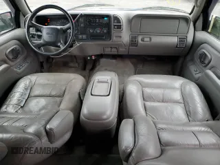 1999 GMC Yukon with VIN 1GKEK13R2XJ728279, listed as a Copart auction lot 84099064 with 162,131 mi miles and Clean Title. Bid and sale history available at carsss.com. Image 8.