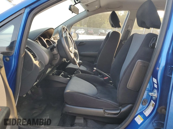 2007 Honda Fit Sport with VIN JHMGD37657S061775, listed as a Copart auction lot 69941734 with 213,944 mi miles and Salvage Title. Bid and sale history available at carsss.com. Image 7.