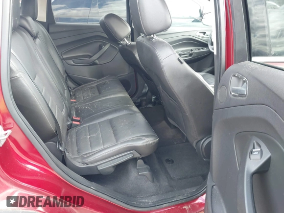 2014 Ford Escape Titanium with VIN 1FMCU9J95EUB05518, listed as a IAAI auction lot 41734025 with 188,243 mi miles. Bid and sale history available at carsss.com. Image 8.