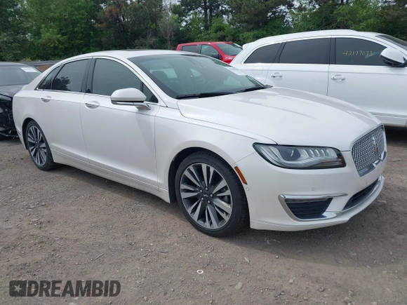 2019 Lincoln MKZ Hybrid Reserve II z VIN 3LN6L5MUXKR632126, wystawiony jako IAAI lot #42186526 z przebiegiem 130 364 mil mil oraz . Historia ofert i sprzedaży dostępna na DreamBid. Obrazek 1.