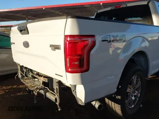 2015 Ford F-150 XLT z VIN 1FTEX1E87FFD13249, wystawiony jako IAAI lot #41214373 z przebiegiem 66 076 mil mil oraz . Historia ofert i sprzedaży dostępna na DreamBid. Obrazek 19.