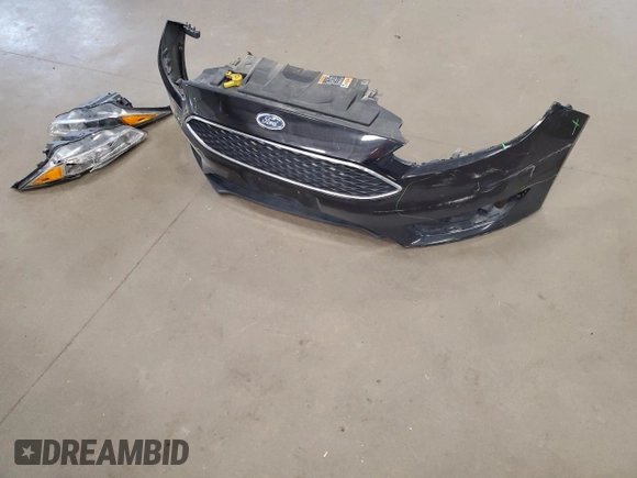 2015 Ford Focus SE z VIN 1FADP3F29FL255928, wystawiony jako Copart lot #72643654 z przebiegiem 189 984 mil mil oraz Szkoda całkowita • Salvage title. Historia ofert i sprzedaży dostępna na DreamBid. Obrazek 12.