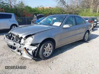 2003 Mercedes-Benz E-Class 3.2L with VIN WDBUF65J93X099223, listed as a IAAI auction lot 42033473 with 230,758 mi miles. Bid and sale history available at carsss.com. Image 19.