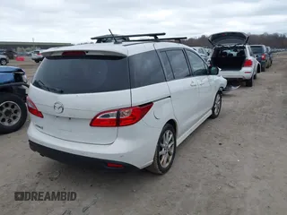 2013 Mazda Mazda5 Grand Touring with VIN JM1CW2DL7D0160703, listed as a IAAI auction lot 42050226 with 133,702 mi miles. Bid and sale history available at carsss.com. Image 4.