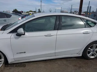 2018 Ford Fusion SE z VIN 3FA6P0LU5JR188171, wystawiony jako IAAI lot #41632358 z przebiegiem 73 677 mil mil oraz . Historia ofert i sprzedaży dostępna na DreamBid. Obrazek 14.