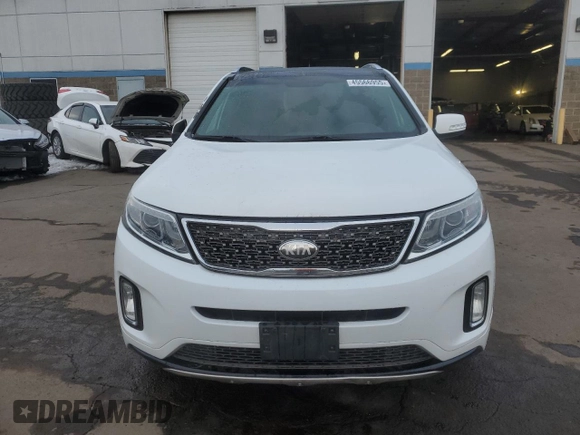 2014 Kia Sorento SX Limited z VIN 5XYKWDA79EG451665, wystawiony jako Copart lot #45566955 z przebiegiem 116 993 mil mil oraz Szkoda całkowita • Salvage title. Historia ofert i sprzedaży dostępna na DreamBid. Obrazek 5.