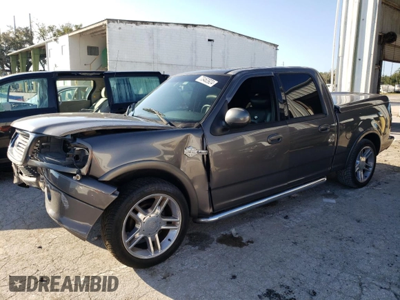 2002 Ford F-150 Harley Davidson with VIN 1FTRW07392KD46352, listed as a Copart auction lot 73463924 with 135,813 mi miles and Salvage Title. Bid and sale history available at carsss.com. Image 1.