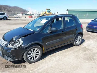 2013 Suzuki SX4 Crossover with VIN JS2YB5A31D6101463, listed as a IAAI auction lot 41941581 with 48,974 mi miles and . Bid and sale history available at DreamBid. Image 2.
