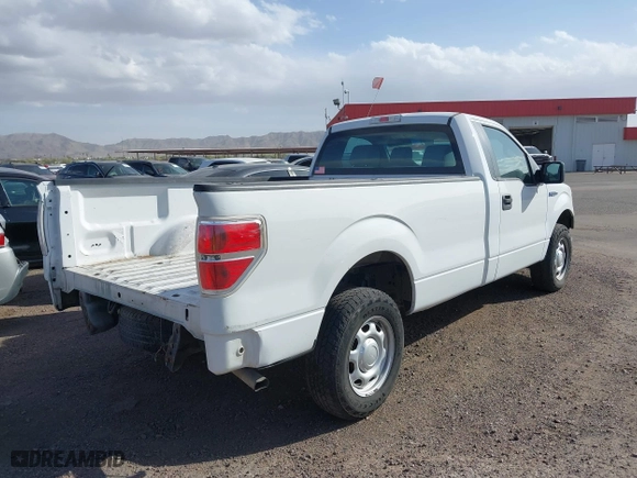 2014 Ford F-150 XL with VIN 1FTMF1CM4EKE98669, listed as a IAAI auction lot 41310314 with 133,239 mi miles. Bid and sale history available at carsss.com. Image 4.