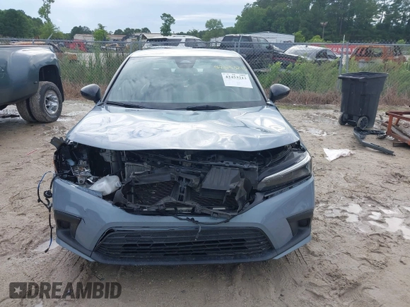 2023 Honda Civic Sport with VIN 2HGFE2F5XPH546709, listed as a IAAI auction lot 42453213 with 46,768 mi miles and . Bid and sale history available at DreamBid. Image 12.