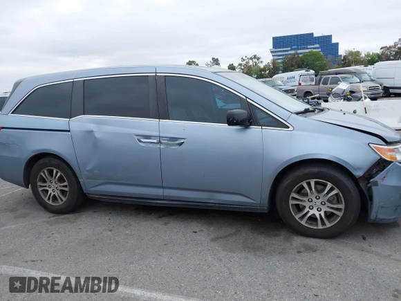2012 Honda Odyssey EX-L with VIN 5FNRL5H66CB061847, listed as a IAAI auction lot 42162377 with 217,204 mi miles and . Bid and sale history available at DreamBid. Image 13.