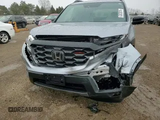 2023 Honda Passport TrailSport with VIN 5FNYF8H64PB044233, listed as a Copart auction lot 53522015 with 10,458 mi miles and Salvage title. Bid and sale history available at DreamBid. Image 13.
