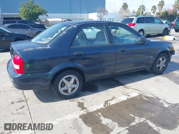 1999 Mazda Protege DX z VIN JM1BJ2229X0189290, wystawiony jako IAAI lot #41796448 z przebiegiem 281 528 mil mil oraz . Historia ofert i sprzedaży dostępna na DreamBid. Obrazek 4.