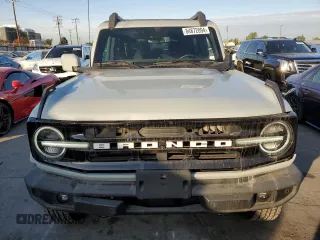 2021 Ford Bronco z VIN 1FMDE5AP0MLA98152, wystawiony jako Copart lot #84872094 z przebiegiem 10 907 mil mil oraz Szkoda całkowita • Salvage title. Historia ofert i sprzedaży dostępna na DreamBid. Obrazek 5.