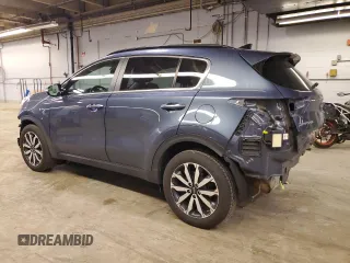 2018 Kia Sportage EX z VIN KNDPNCACXJ7384193, wystawiony jako Copart lot #43645195 z przebiegiem 55 717 mil mil oraz Szkody całkowita. Historia ofert i sprzedaży dostępna na DreamBid. Obrazek 2.