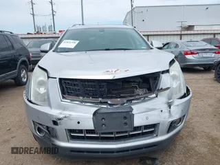 2015 Cadillac SRX Performance Collection z VIN 3GYFNCE36FS633386, wystawiony jako IAAI lot #41851338 z przebiegiem 102 586 mil mil oraz . Historia ofert i sprzedaży dostępna na DreamBid. Obrazek 12.