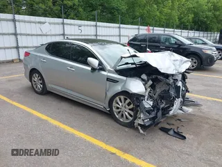 2015 Kia Optima EX with VIN 5XXGN4A74FG517263, listed as a IAAI auction lot 42299534 with 116,875 mi miles and . Bid and sale history available at DreamBid. Image 1.