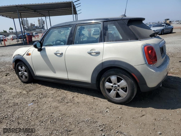 2015 MINI Cooper Hardtop 4 Door with VIN WMWXS5C56FT829947, listed as a Copart auction lot 62911434 with NaN miles and Salvage Title. Bid and sale history available at carsss.com. Image 2.