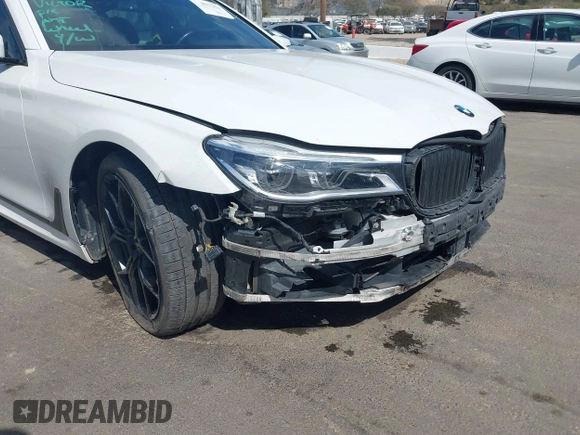 2017 BMW 7 Series 750i with VIN WBA7F0C32HGM22273, listed as a IAAI auction lot 41857151 with 90,518 mi miles and . Bid and sale history available at carsss.com. Image 17.